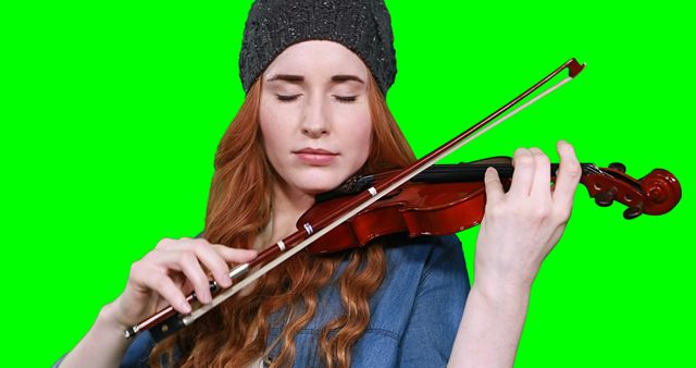 Woman with Red Hair Playing Violin Against Green Screen - Download Free Stock Images Pikwizard.com