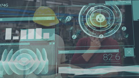 Engineers Analyzing Data with Futuristic Interface in Factory