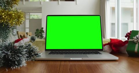 Laptop with Green Screen in Festive Holiday Setting - Download Free Stock Images Pikwizard.com