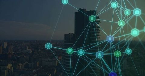 Futuristic Network Overlay Above Cityscape at Dusk