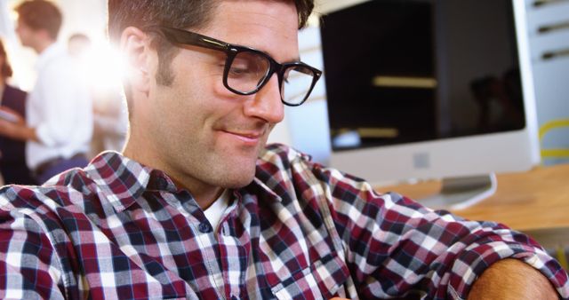 Business Professional Smiling at Desk in Modern Office - Download Free Stock Images Pikwizard.com