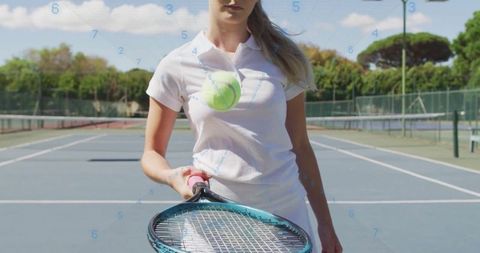 Female Tennis Player Tossing Ball on Court with Digital Overlay