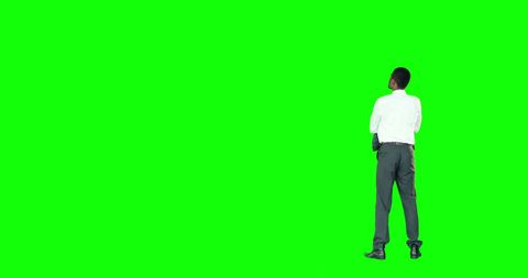 Professional Businessman on Green Background with Copy Space