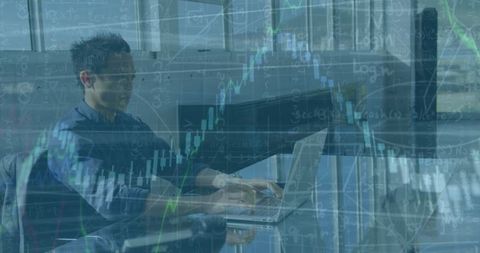 Engineer Analyzing Financial Data on Laptop Tied to Technology