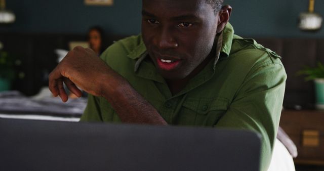 Focused Man Working on Laptop in Home Office - Download Free Stock Images Pikwizard.com