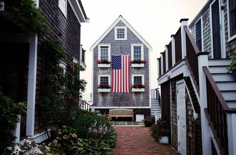 Charming coastal cottage with american flag display