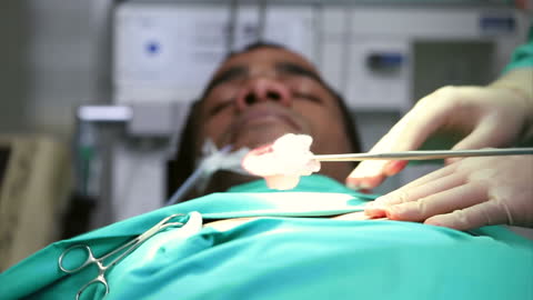Surgical Precision in Operating Room with Unconscious Patient