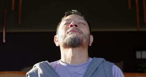 Mature Man Meditating with Serenity in Peaceful Environment