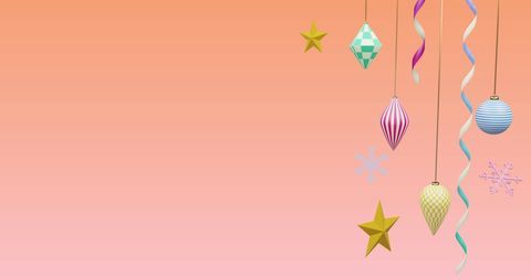 Colorful Christmas Ornaments on Soft Pink Background
