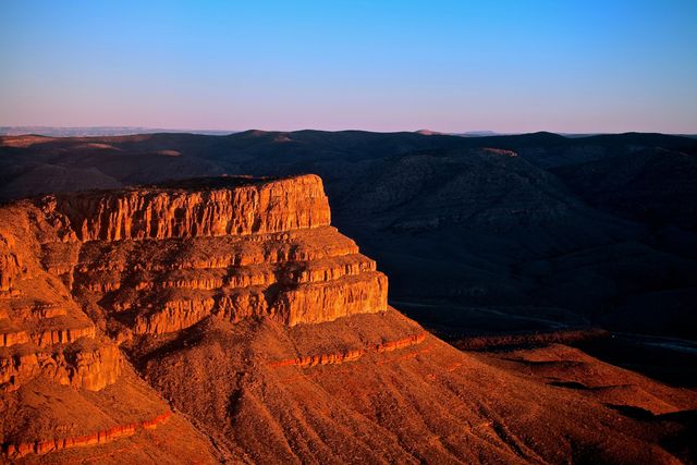 Majestic Desert Canyon Illuminated by Evening Sun - Download Free Stock Photos Pikwizard.com