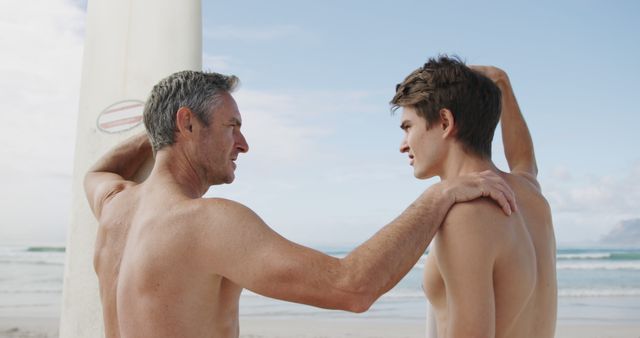 Father and Son Surfing Beach Bonding - Download Free Stock Images Pikwizard.com