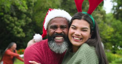 Happy Couple in Love Embracing Outdoor Festive Season