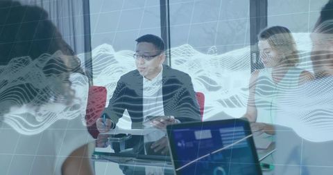 Executive presenting with tablet in data-driven boardroom with digital wave overlay