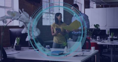 Modern Workspace Collaboration Between Colleagues in Open-Plan Office