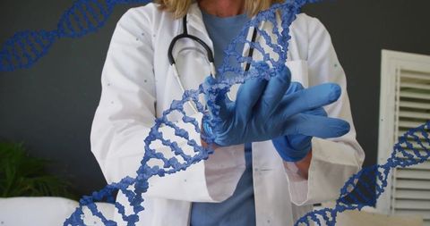 Physician Preparing Gloves with DNA Helix Overlay for Genetic Testing and Clinical Care