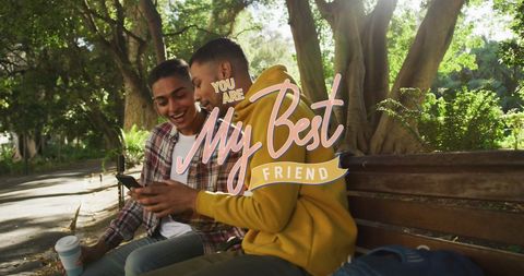 Biracial Friends Smiling Together with Smartphone Outdoors - Download Free Stock Images Pikwizard.com