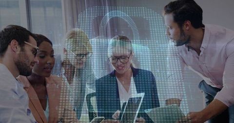 Diverse Colleagues Discussing Cybersecurity Concepts in Office