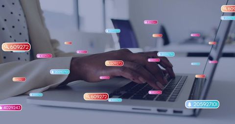 Businesswoman typing on laptop with floating social media analytics tags and data overlays
