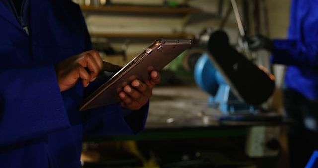 Engineer Using Tablet in Industrial Workshop - Download Free Stock Images Pikwizard.com