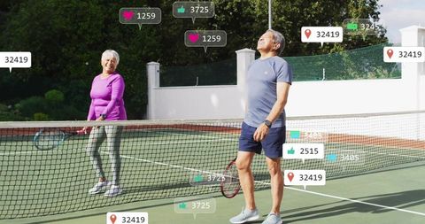 Active Senior Couple Enjoys Outdoor Tennis Game With Digital Engagement
