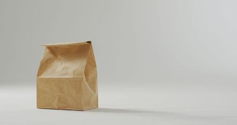 Eco-Friendly Kraft Paper Bag on Clean Surface