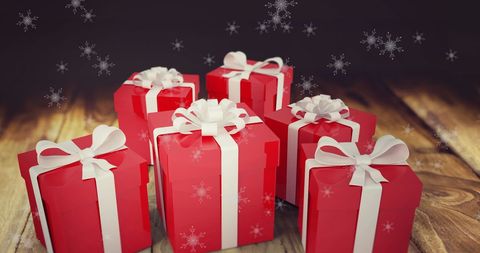 Christmas Presents with Falling Snow on Wooden Floor Background - Download Free Stock Images Pikwizard.com