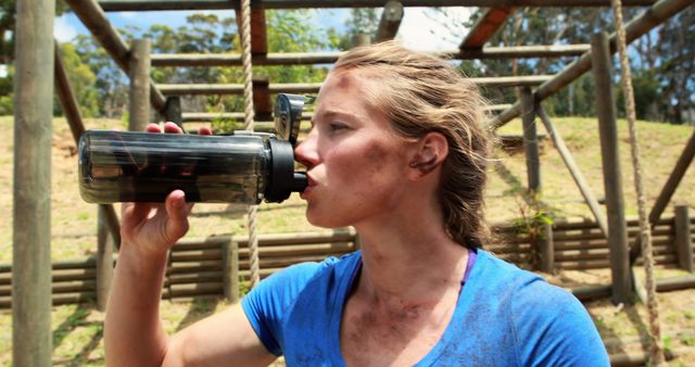 Woman Drinking Water After Intense Outdoor Workout - Download Free Stock Images Pikwizard.com