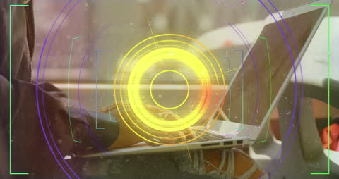 Augmented Reality Tech Overlay on Laptop User in Transit