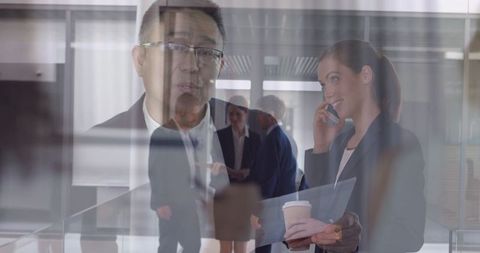 Composite of Businessman and Businesswoman in Corporate Environment - Download Free Stock Images Pikwizard.com