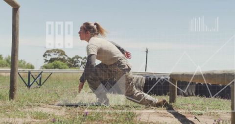 Female soldier tackling obstacle course with determination