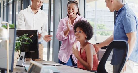 Energetic Team Working Together in Modern Office