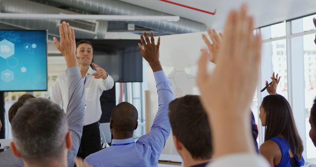 Diverse Group of Professionals Engaging in Interactive Business Presentation - Download Free Stock Images Pikwizard.com