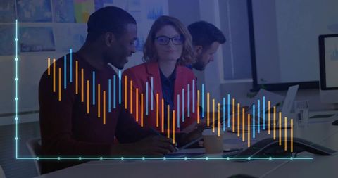 Diverse Office Team Analyzing Data with Tablet and Graph Overlay
