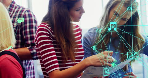 Young Professionals Engaging with Digital Network Interface