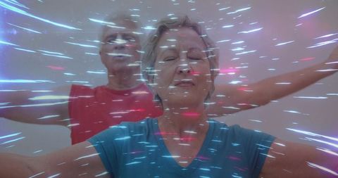 Senior Couple Practicing Mindful Breathing and Gentle Stretching with Dynamic Light Trails, Studio