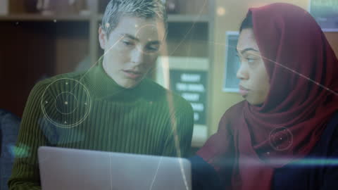 Diverse Women Collaborating with Futuristic Technology Interface