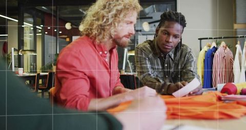 Visionary male designers creating fashion inspirations together