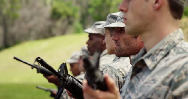 Focused Military Personnel Training with Rifles Outdoors - Download Free Stock Images Pikwizard.com