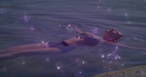 Person Floating in Water with Purple Geometric Animation