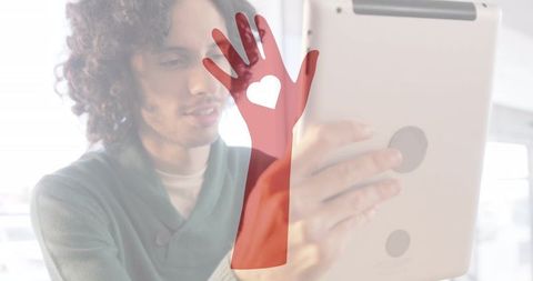 Young Man Engaging with Tablet Technology Lounge Vibes