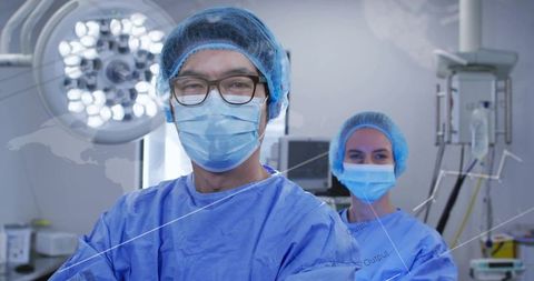 Surgical team preparing and performing operation in modern sterile operating room