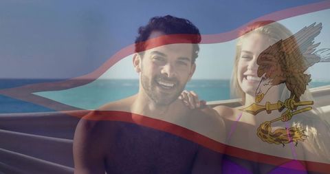 Happy Couple with Union Flag Enjoying Tropical Beach Vacation