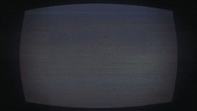 Retro crt tv with static noise and scan lines in dark room