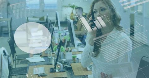 Office Worker Using Smartphone and Tablet with Digital Data Overlay for Team Productivity
