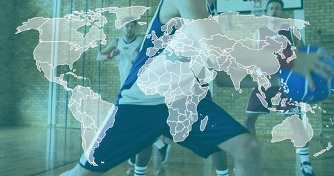 Lunging basketball defenders with world map overlay representing global teamwork
