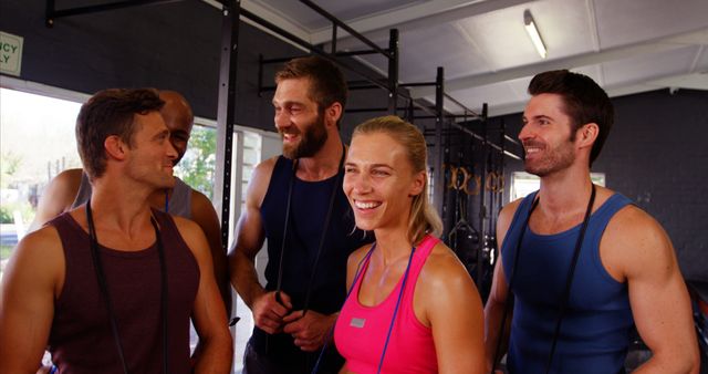 Group of Happy Adults in Gym Enjoying Conversation - Download Free Stock Images Pikwizard.com