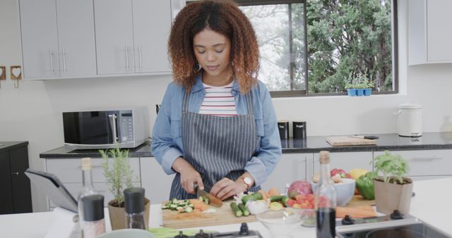 Woman Chopping Vegetables in Modern Home Kitchen - Download Free Stock Images Pikwizard.com