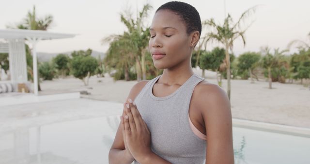 Meditating Woman Practicing Yoga Outdoors in Serene Environment - Download Free Stock Images Pikwizard.com