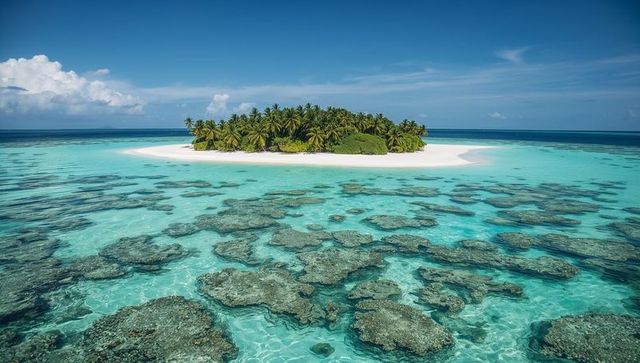 Tropical island oasis with turquoise water and coral reefs