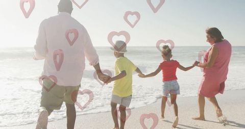 Family Bonding at Beach with Heart Motifs